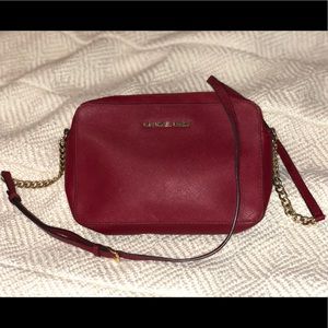 Red Michael Kors crossbody bag
